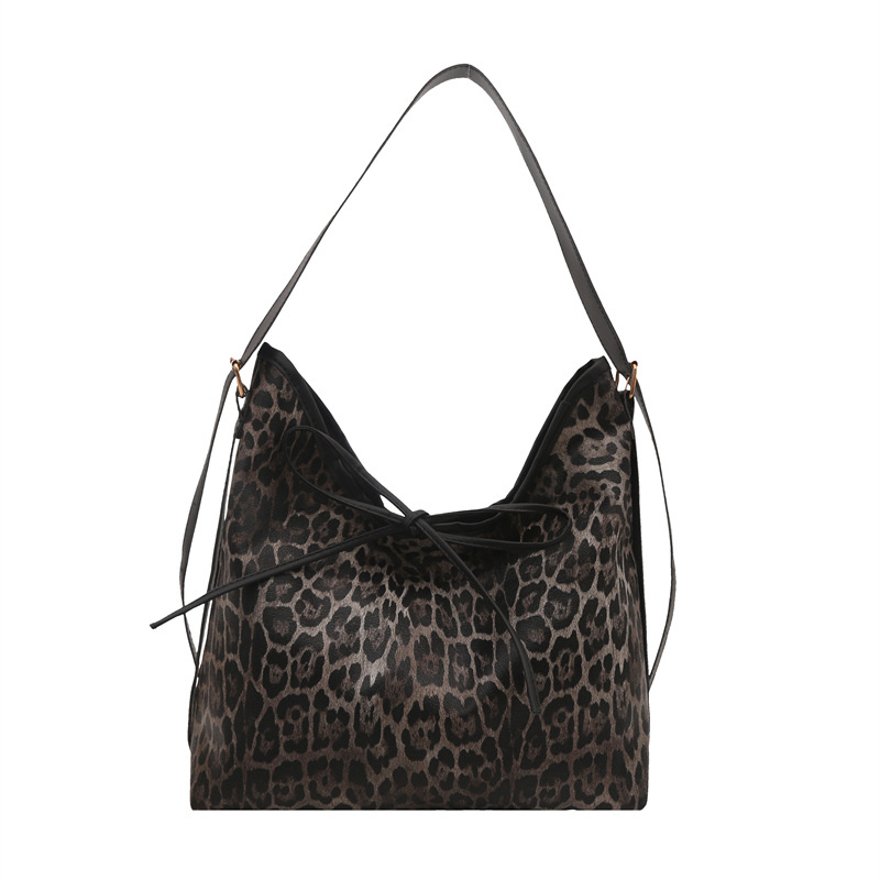 Bolsa de leopardo retro de hombro para mujeres 2025 nueva moda para estudiantes universitarios clase de viaje perezoso viento de gran capacidad bolsa de mano
