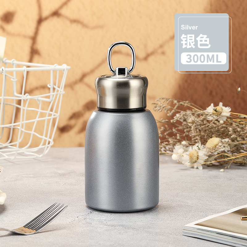 Taza termo de moda nacional de estilo caliente, taza termo de mano portátil al aire libre de moda para el hogar, taza de agua para estudiantes, taza termo para automóvil