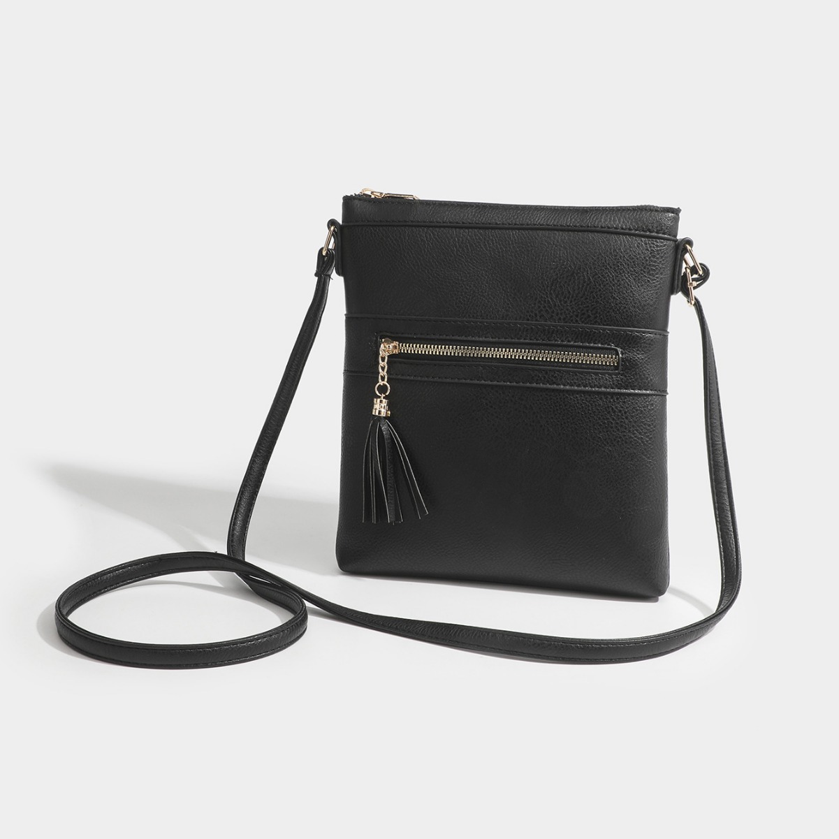 Dames schoudertas in retrostijl met kwastje en ritssluiting_voghion.com