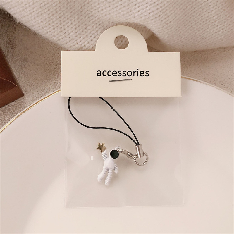 Cosmonautas lindos colgantes superman astronautas estelares móviles colgantes bolsos llaveros colgantes