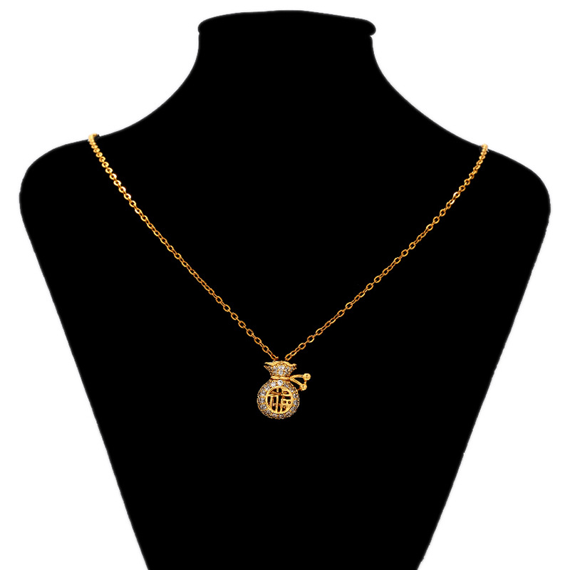 Collar colgante de bolsa de la suerte de diamante completo chapado en oro de aleación de cobre Xuping Fuzi femenino diseño hueco sentido colgante de moda de nicho