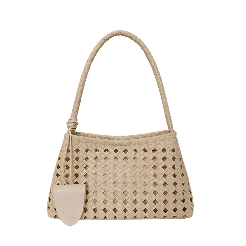 Bolsa de brazo hueco para mujeres 2026 verano nuevo estilo francés lujoso viaje de hombro portátil bolso de palo