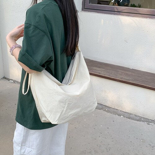 Korean-style pleated drawstring cloud bag, new design large capacity lazy style single shoulder crossbody bag, niche commuting bag
