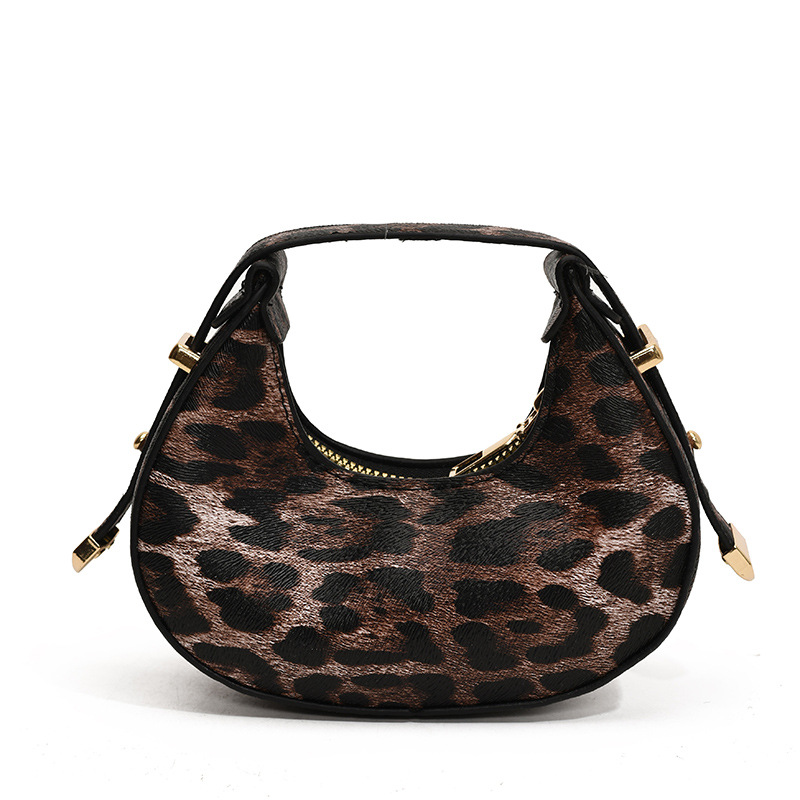 Tendencia nueva bolsa de mujer casual 2024 personalidad coreana de invierno mini media luna temperamento leopardo bolso de mano