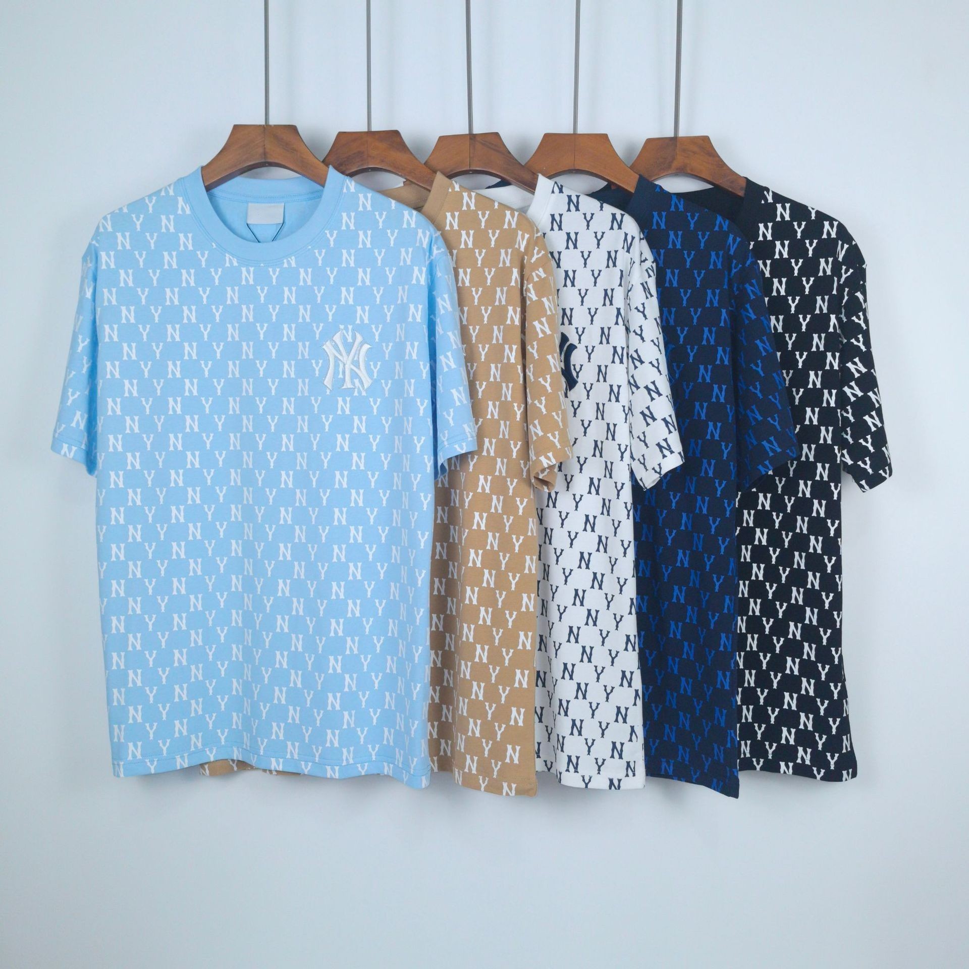 Fábrica al por mayor nueva moda Coreana de alta calidad impresa algodón manga corta hombres y mujeres mismo estilo pareja camiseta suelta soporte código de escaneo