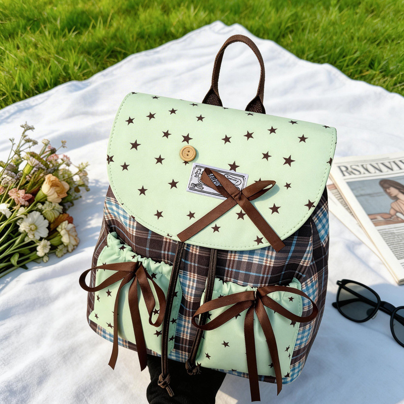 Mochila de estilo universitario de mujer nicho mochila 2026 nueva mochila simple a cuadrillas de viaje bolsa de estilo británico de mujer