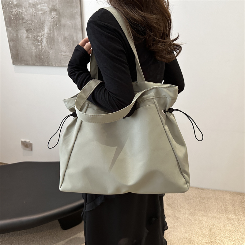 Bolso de lona para mujeres 2024 nuevo este año popular bolsa de gran capacidad de verano universal bolsa de viaje de hombro