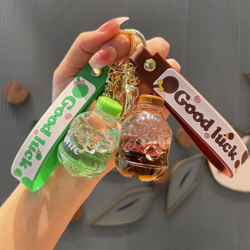 Oil liquid cola drift bottle key chain pendant exquisite creative backpack car student couple key chain Oil liquid cola drift bottle key chain pendant exquisite creative backpack car student couple key chain