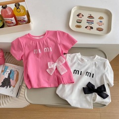 女童夏裝短袖T恤寶寶洋氣兒童個性潮韓版字母蝴蝶結開叉時髦上衣