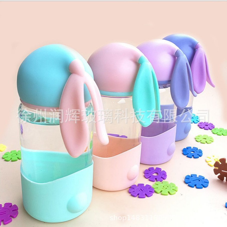  Taza de vidrio con orejas de conejo, diseño lindo para niños, ideal para regalos promocionales con logo.