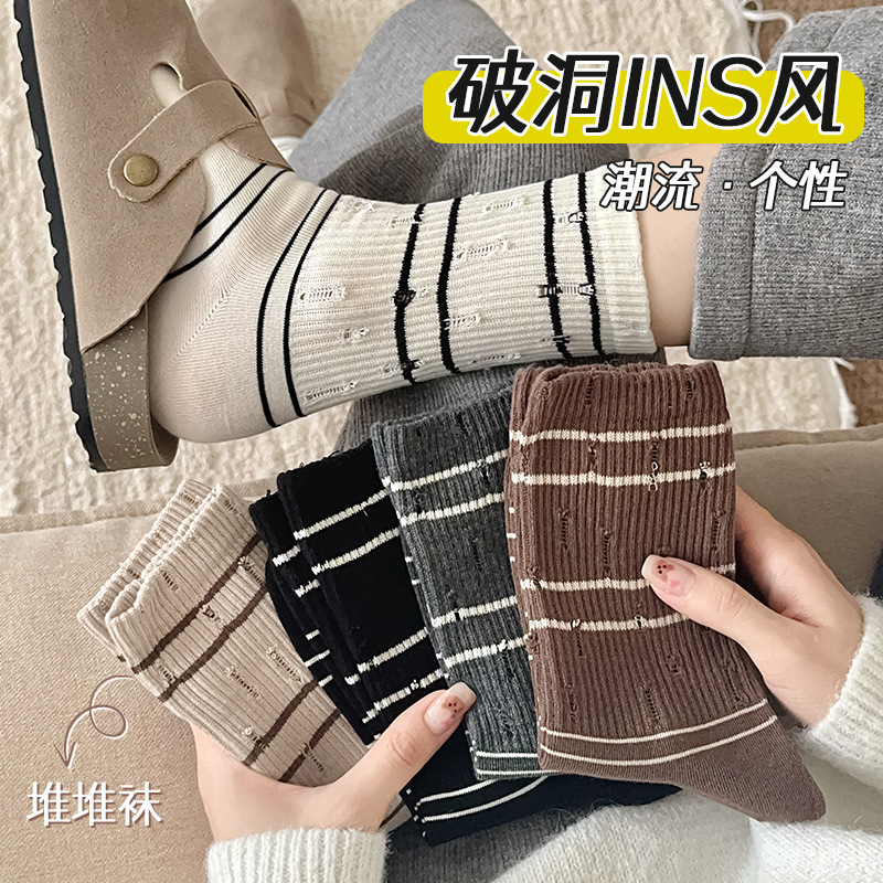 Piles de calcetines a rayas de mujer personalidad de tendencia otoño-invierno calcetines de algodón sin hueso al por mayor