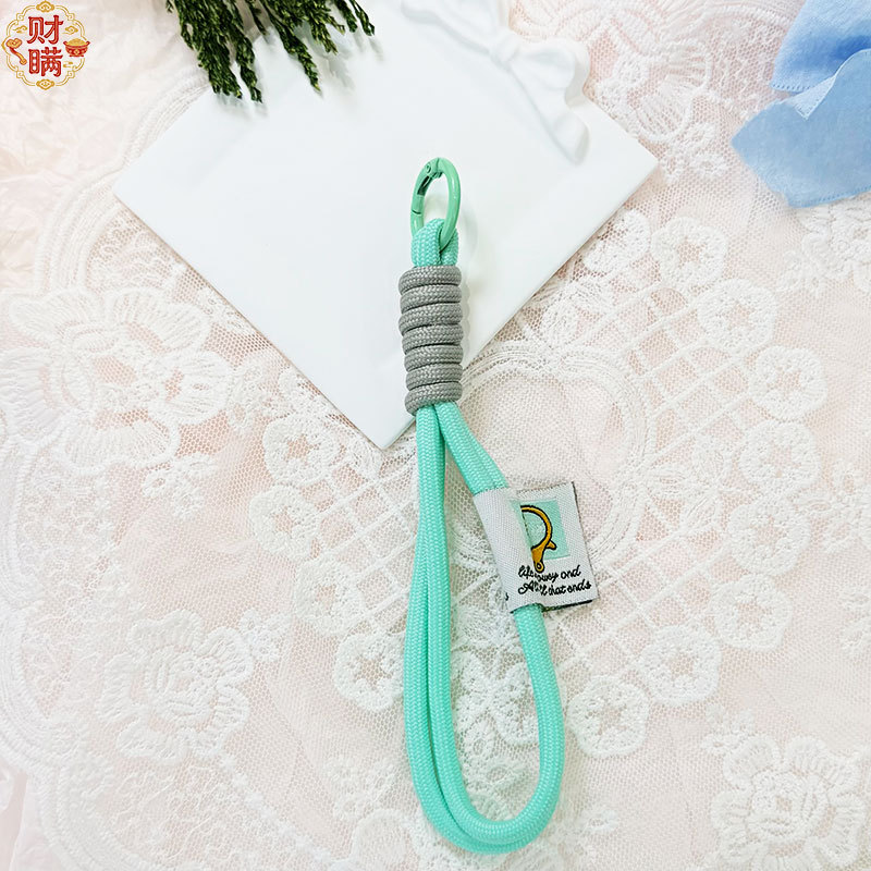Doble capa de nylon trenzado accesorios llavero bolso colgante de montaña fichaje de peluche muñeca cadena de teléfono móvil colgante con