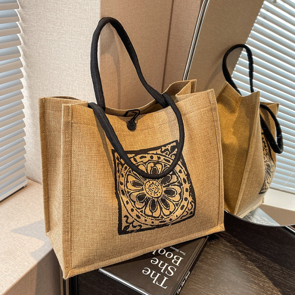 Capacious shoulder bag