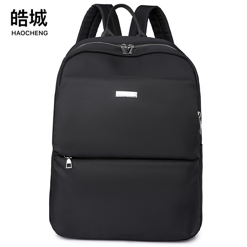 2023 invierno nuevo estilo casual damas mochila de nailon simple y versátil mochila de viaje de negocios de gran capacidad al por mayor