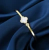 Golden bracelet, four-leaf clover