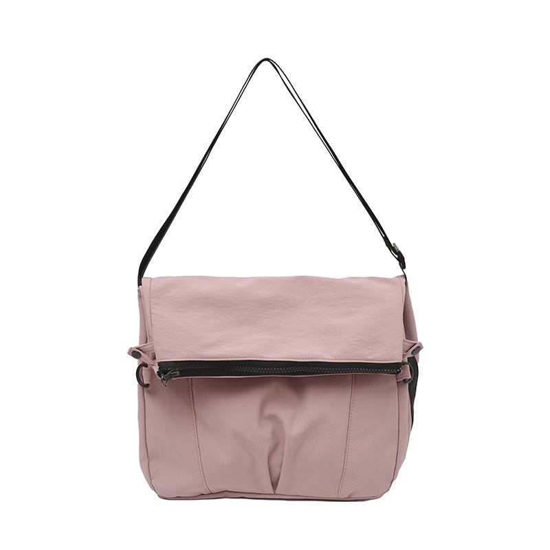 Bolso de lona de moda coreana 2025 verano nuevo bolso femenino estilo universitario bolso de hombro casual bolso de mensajero de gran capacidad marea