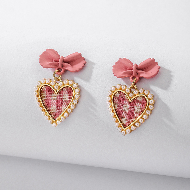 925 Silver Needle Vintage Pearl Fabric Love Heart Bow Tie Earrings European And American Ins Simple Autumn And Winter Check Graceful Earrings display picture 3