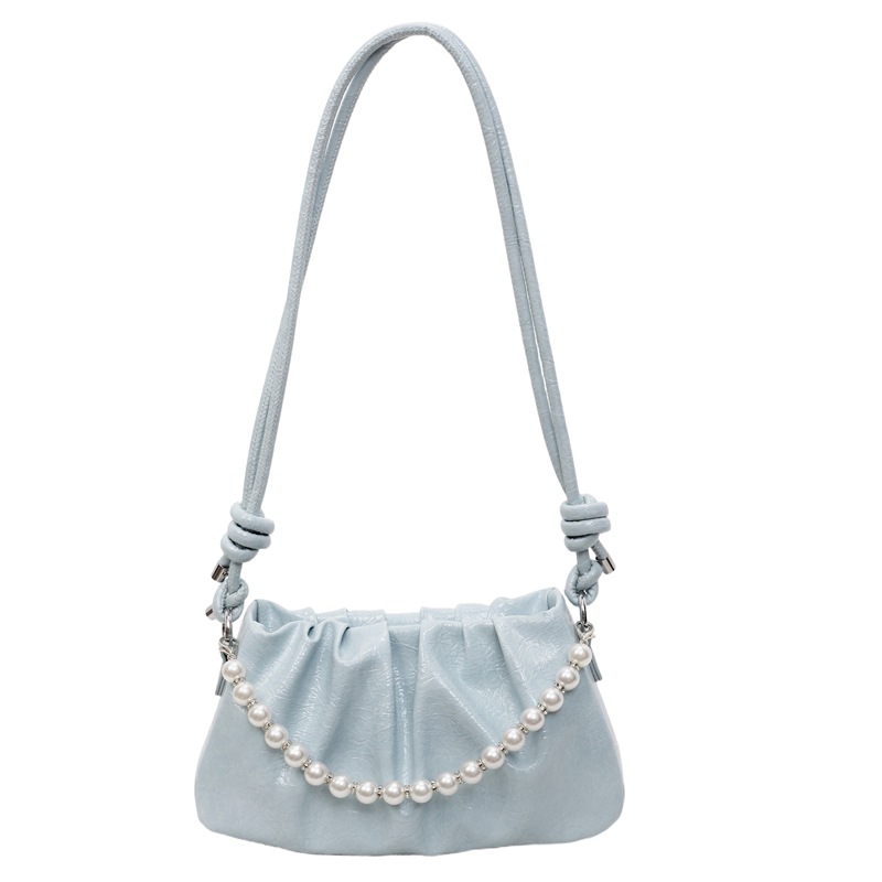 Bolsa de nube plegable de comercio exterior para mujeres 2025 nueva bolsa de brazo de aire extranjero versátil alta sensación de mochila de viaje