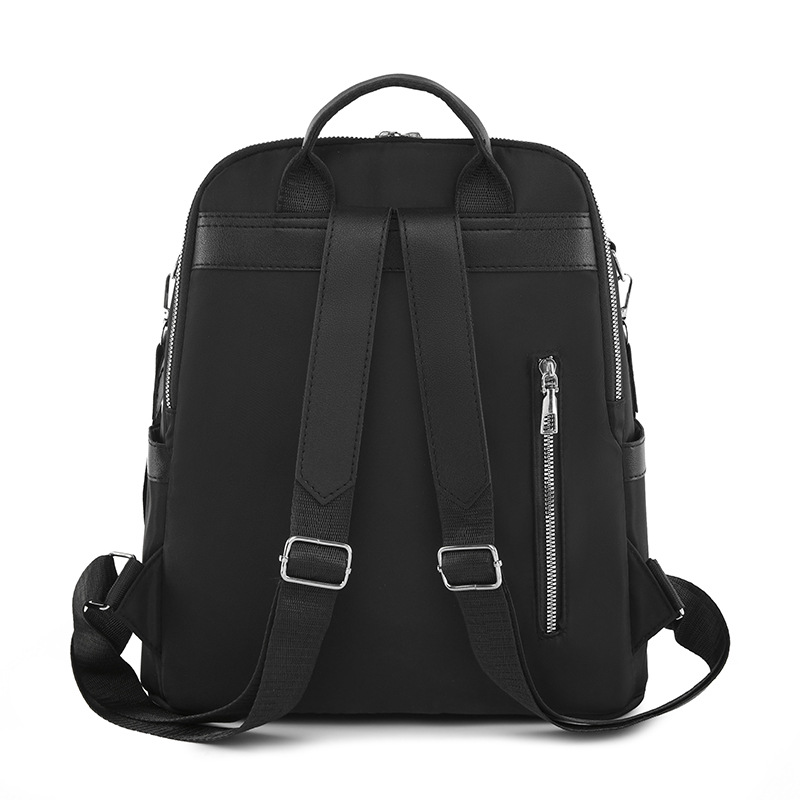 2023 otoño nuevas señoras casuales mochila de tela Oxford borla de moda mochila pequeña multifuncional mochila escolar al por mayor