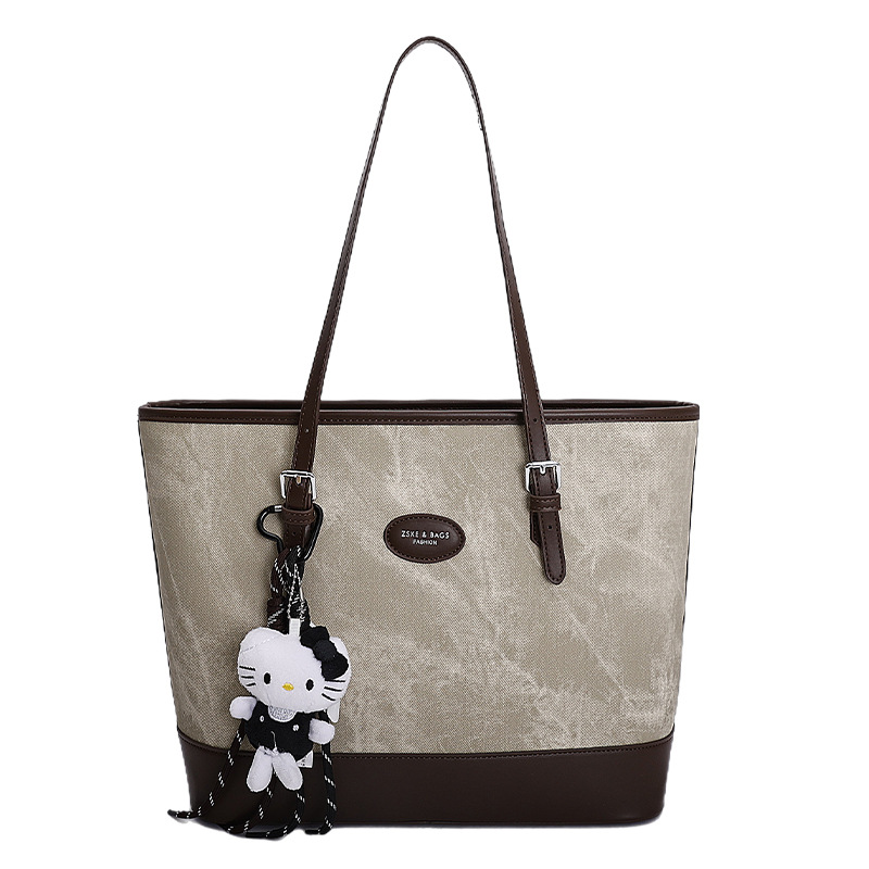 2025 invierno nuevo retro nicho Volkswagen bolso de mano de gran capacidad bolso de hombro de viaje de mujer bolso de brazo de moda versátil bolso de brazo