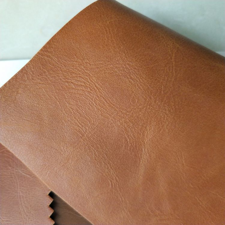 箱包手袋疯马变色PU皮革印刷双色鞋材包装革面料变色复古人造革