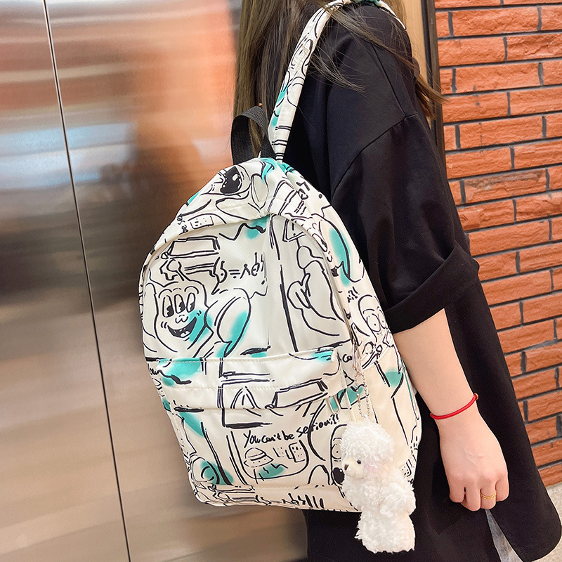 Moda mochila bolsa ins personalizado impreso graffiti estudiante universitario mochila de nylon moda casual todo a juego mochila para mujeres