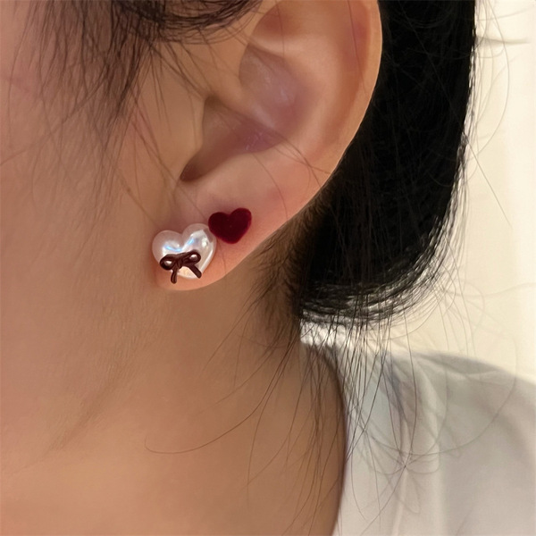 Demi-season earrings with bow