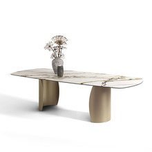 意式轻奢亮光岩板餐桌椅组合时尚不锈钢拉丝家用长方形饭桌子