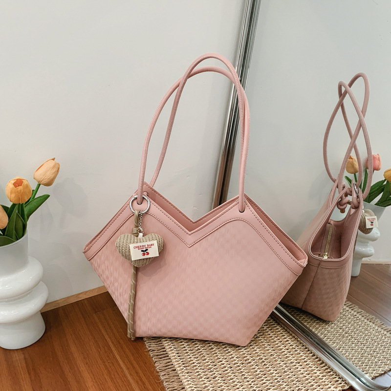 Nicho transfronterizo bolsas de diseño casual para mujeres 2026 nueva moda diaria de verano de gran capacidad de viaje a la axila bolsa de mano