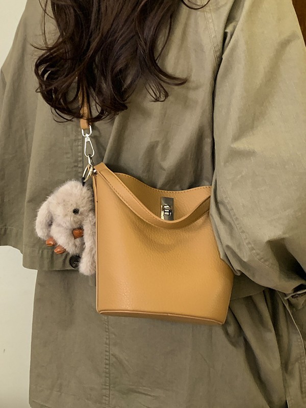 Bolso de nicho coreano portátil cubo de agua bolso para niños ventas calientes nueva textura de alta calidad lujoso ligero ocio versátil bolso de mochila