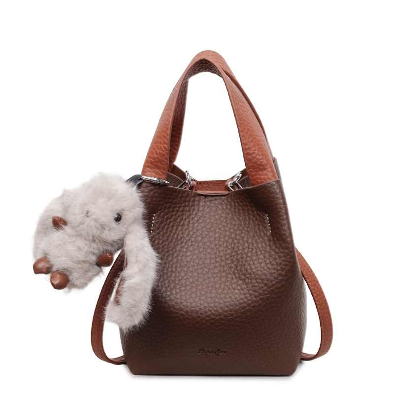 Bolso coreano con estampado de litchi para mujeres 2025 nuevo bolso de cubo de alta calidad de moda versátil bolso de hombro