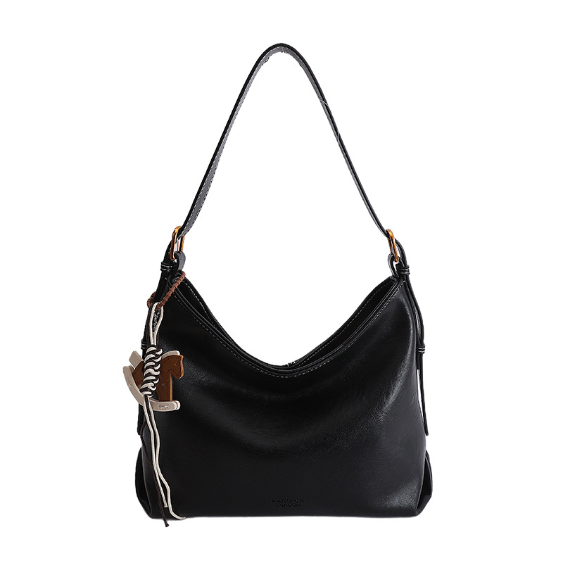 Alta sensación de gran capacidad de viaje bolsa de mano para mujeres Europa y América textura nicho de moda simple universal bolsa de hombro