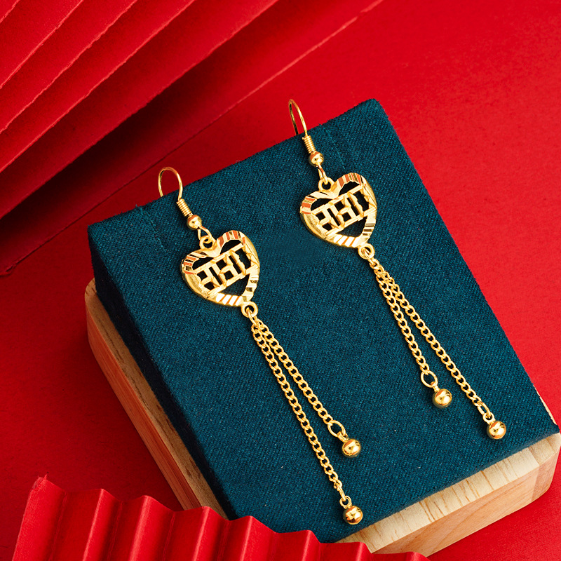 Vietnam arena oro amor oído líneas 520 hueco borla de las mujeres gotas para los oídos no se desvanecen temperamento imitación oro suministro directo de fábrica