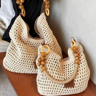 Summer woven handheld straw capacious shoulder bag for leisure, western style