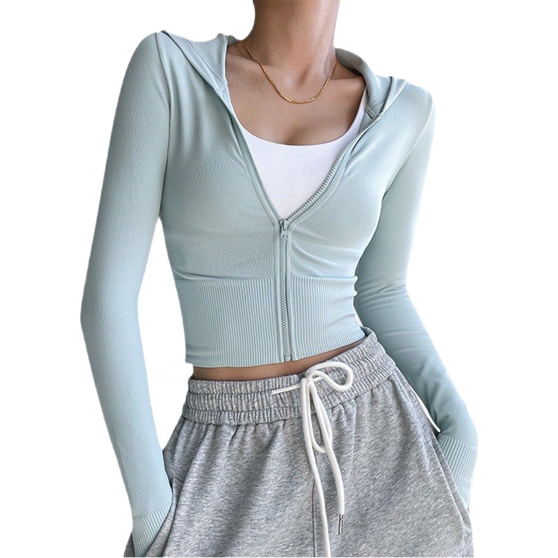 Abrigo de yoga Otoño e Invierno nueva ropa de entrenamiento ajustada elástica de secado rápido de manga larga con capucha superior deportiva para mujeres