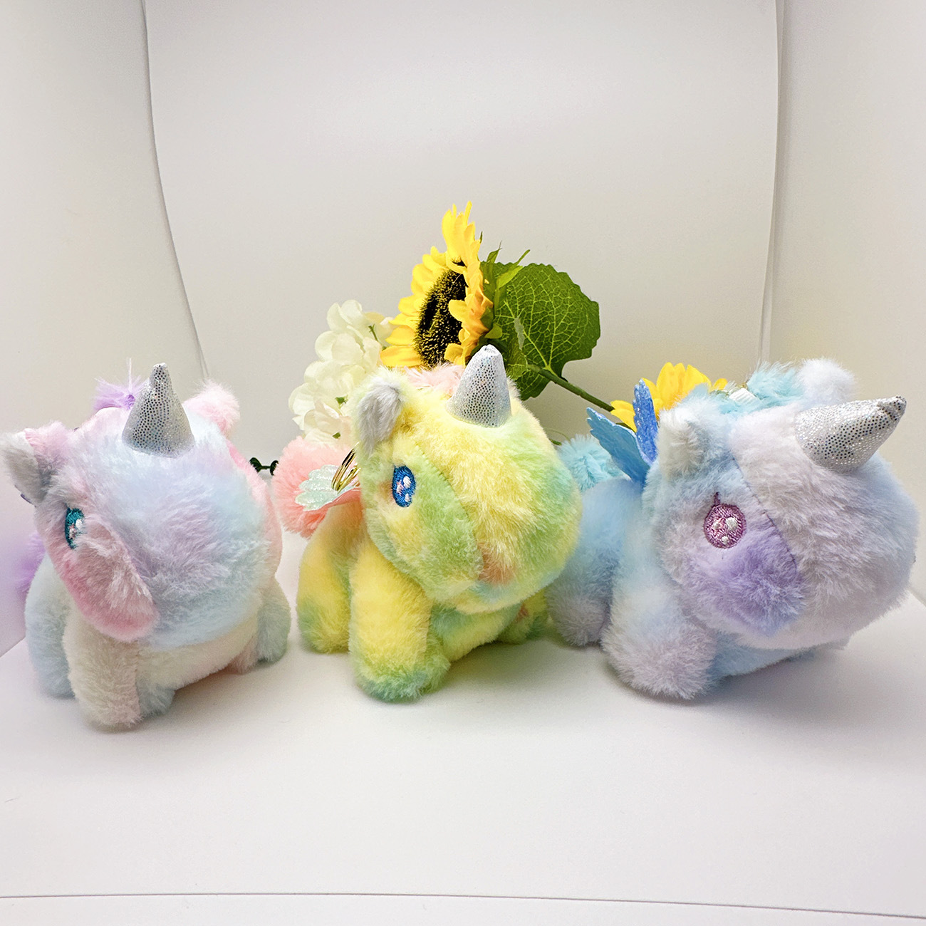 귀여운 봉제 흔들리는 꼬리 유니콘 인형 키 체인 도매 소녀 가방 매달려 부티크 인형 잡아