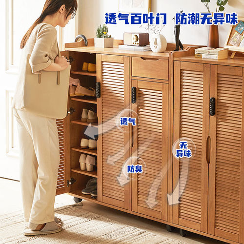 Lockable wooden shoe cabinet with wheels, multi-tiered and movable—ideal for home entryways, outdoor use, and as a secure shoe storage solution.