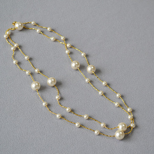 French niche elegant and simple imitation home round high-bright pearl baby's breath long necklace sweater necklace can be double-layered