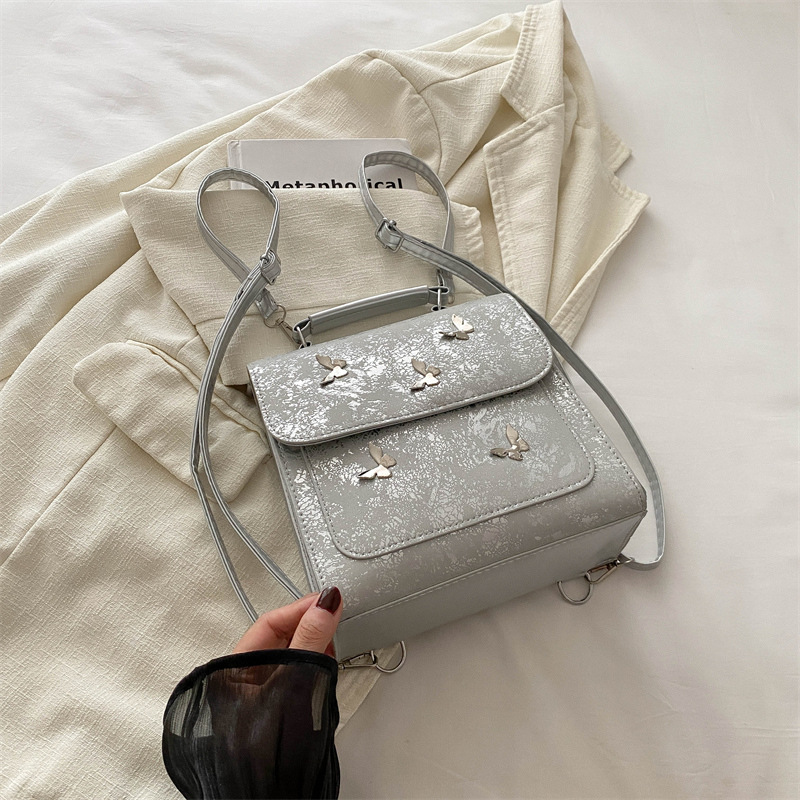 Mochila plateada de moda para mujeres, mochila de estilo coreano, mochila de estudiantes, mochila de viaje ligera de alta calidad