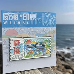 威海市金属スライド冷蔵庫は山東ブルーヴィス号のランドマーク観光スポット観光文創記念品を貼ります。