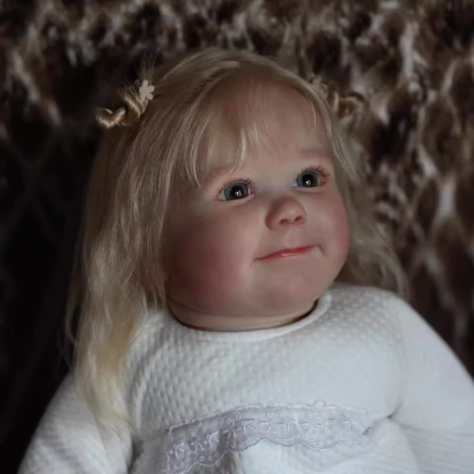 60cm imitación niña muñeca niño junio despierto exquisito pintado 3D piel suministro transfronterizo