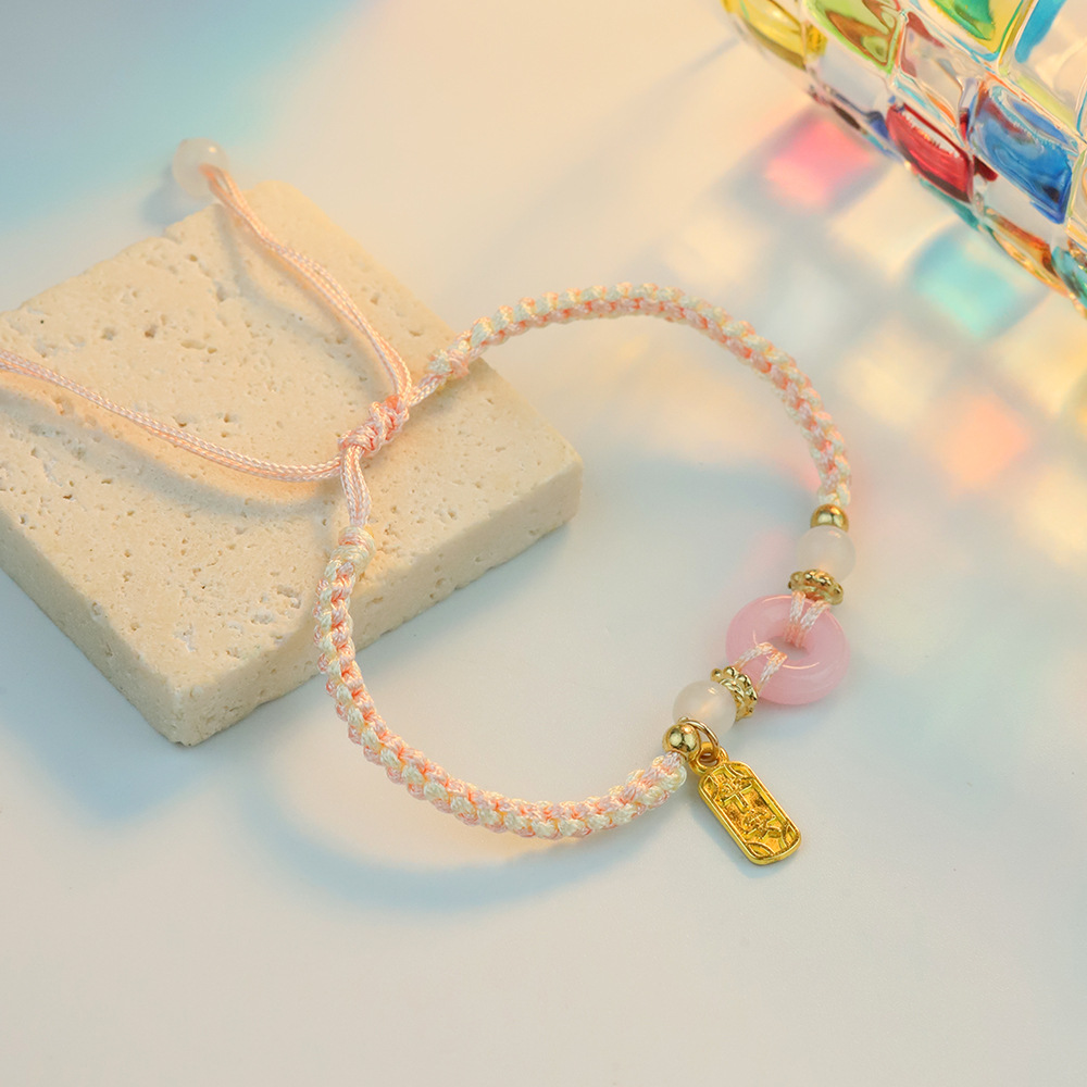 2025 nuevo amigas joyería de mano de melocotón de seguridad pulsera de pareja mujer ligera de lujo nicho tejido de mano