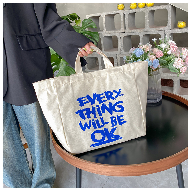 A large-capacity, sturdy Japanese-style canvas bag for women, a new 2022 simple bento handbag for girls to go to work undefined