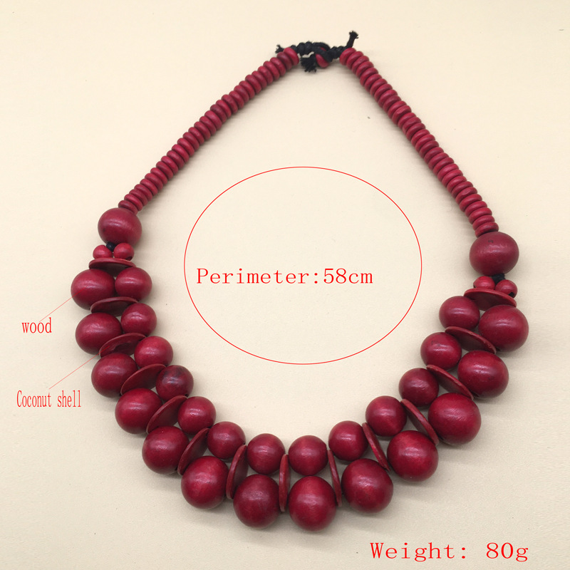 Collana etnica boho con perline in legno e guscio di cocco_voghion.com