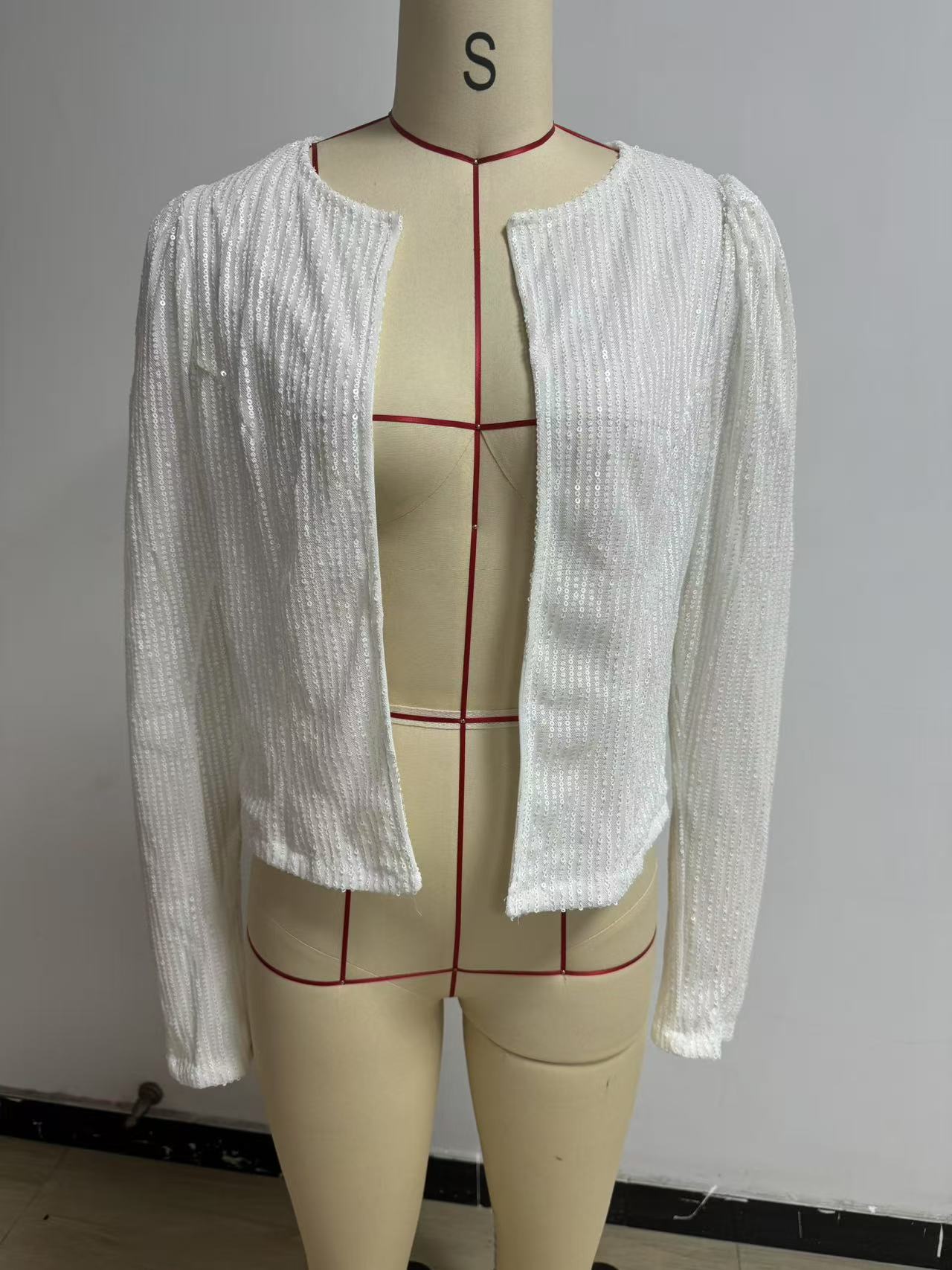 Chaqueta corta informal y versátil de lentejuelas de color liso con cuello alto, estilo europeo y americano, nueva colección primavera 2026 para mujer.