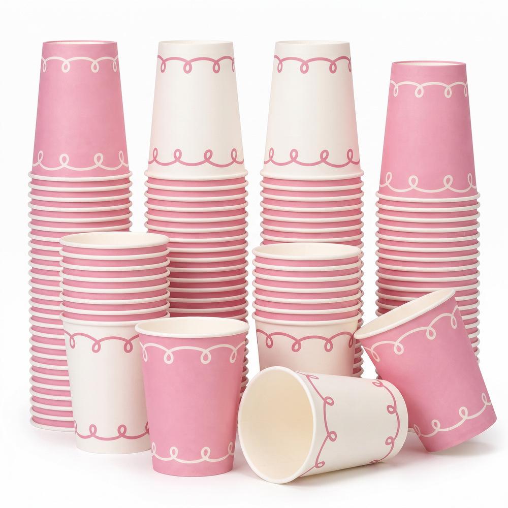 Pink and white patterned disposable paper cups, perfect for a girly-themed party, birthday, baby shower, or afternoon tea