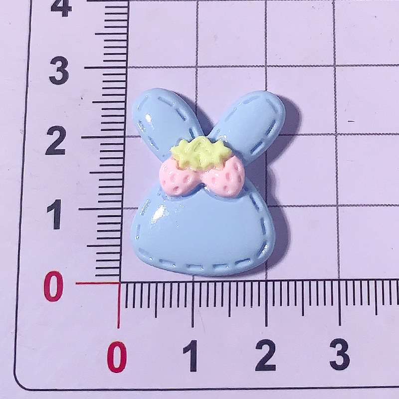 Nuevo color caramelo lindo conejo DIY accesorios de resina crema pegamento para el cabello accesorios para el cabello agujero abrazadera de zapatos agujero material hecho a mano