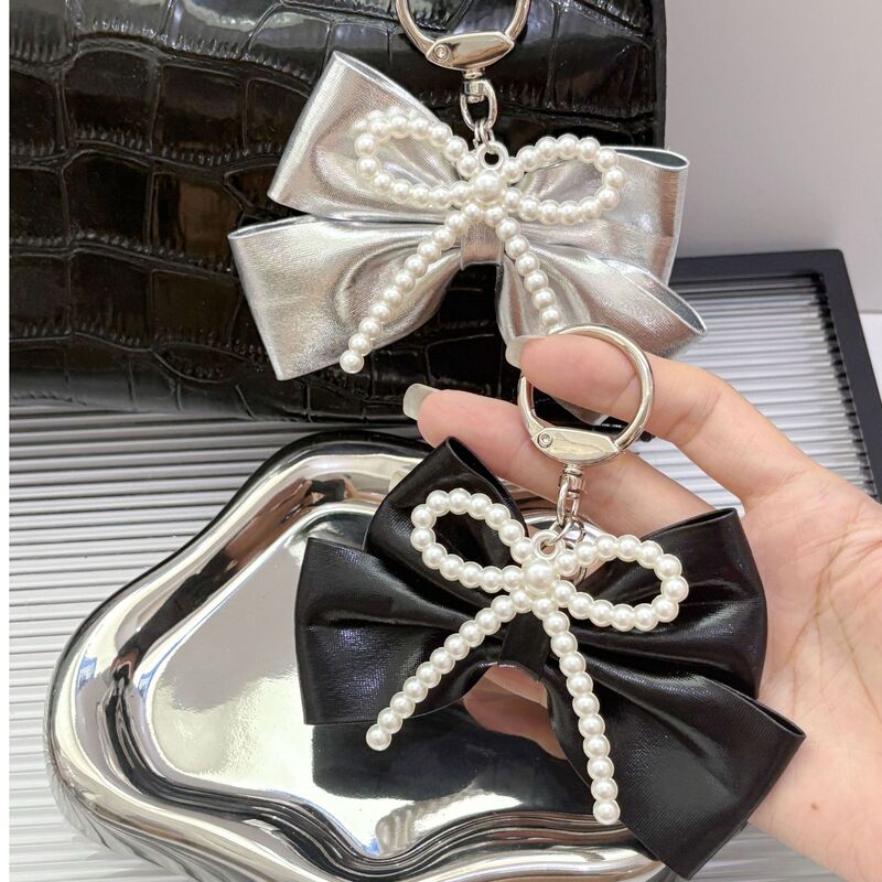 New Silver Bow Car Keychain Retro Cool Black Silver Bag Pendant Niche Design Sweet Girl Pendant New Silver Bow Car Keychain Retro Cool Black Silver Bag Pendant Niche Design Sweet Girl Pendant