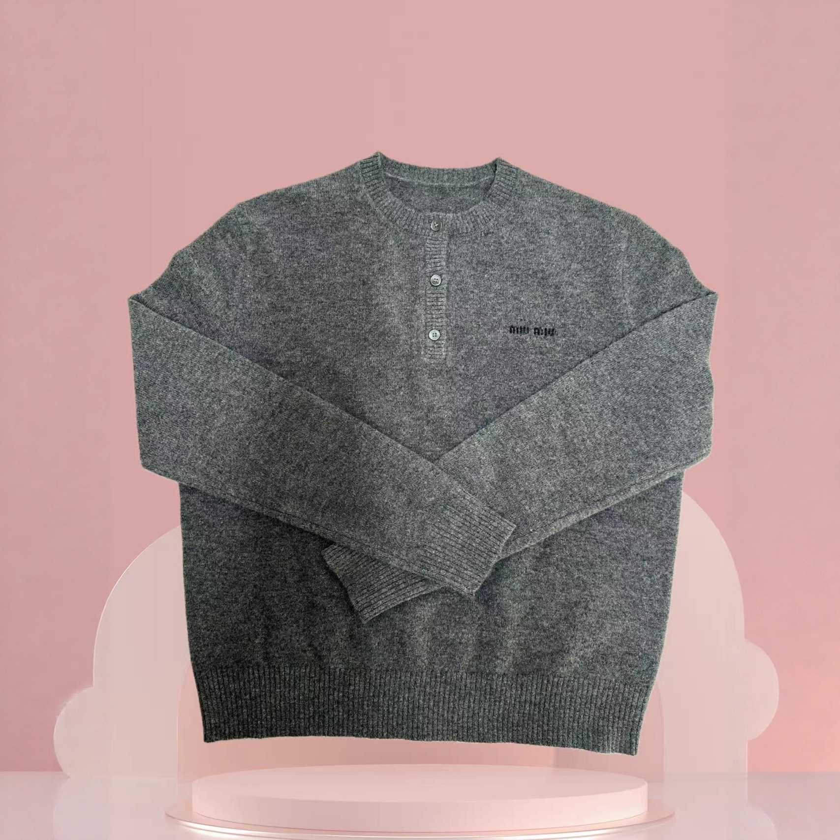 Cashmere demi-season knitted sweater with a round collar
