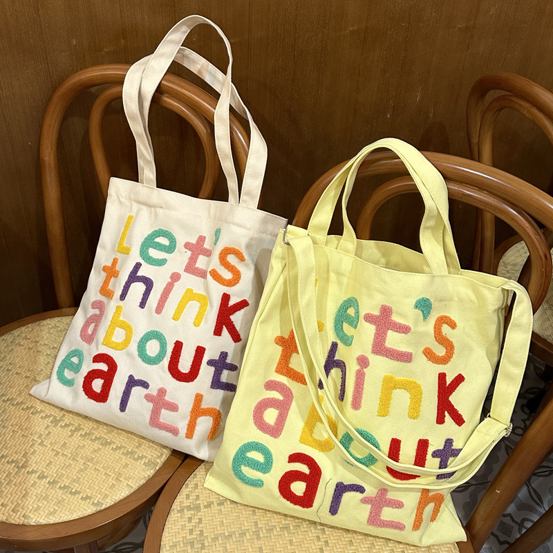 라이트 옐로우 편지 자수 크로스 바디